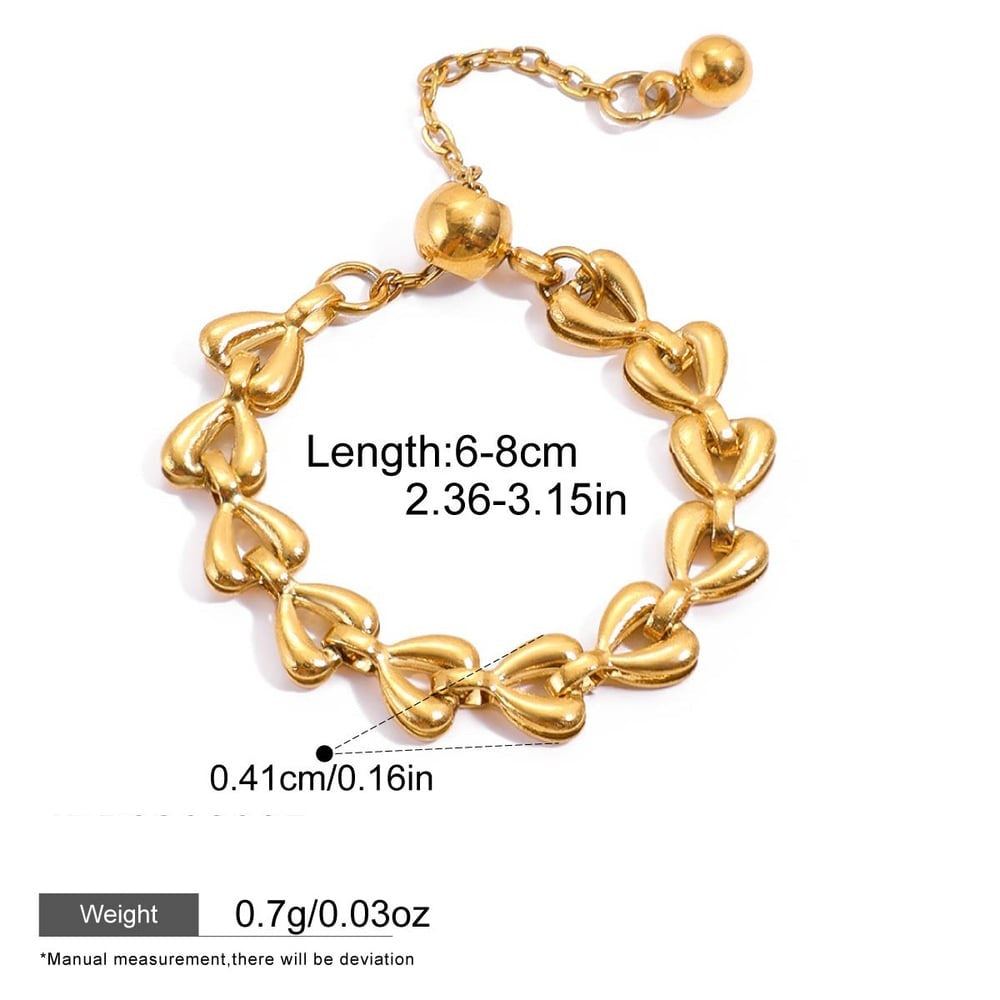 Penelope Gold Tone Hollow Heart Chain Ring