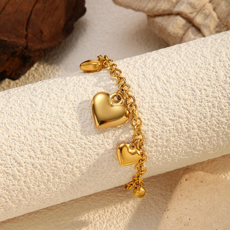 Daphne Gold Tone Hearts Chain Bracelet