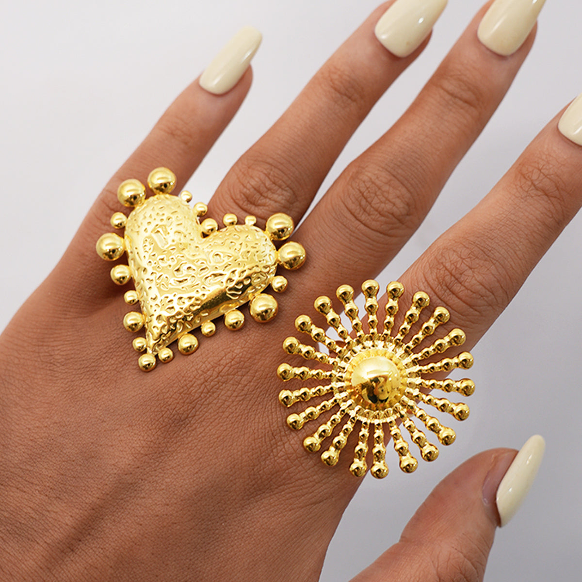 Noelle Gold Tone Heart Statement Ring