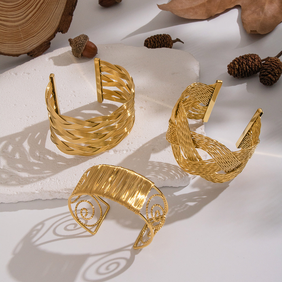 Lucia Gold Tone Interwoven Bangle