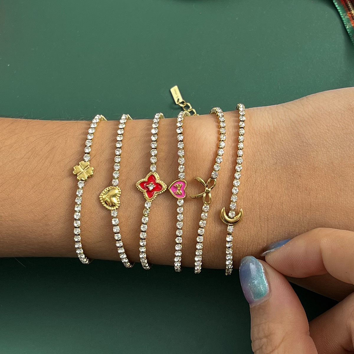 Melody Gold Tone Zircon Clover Bracelet