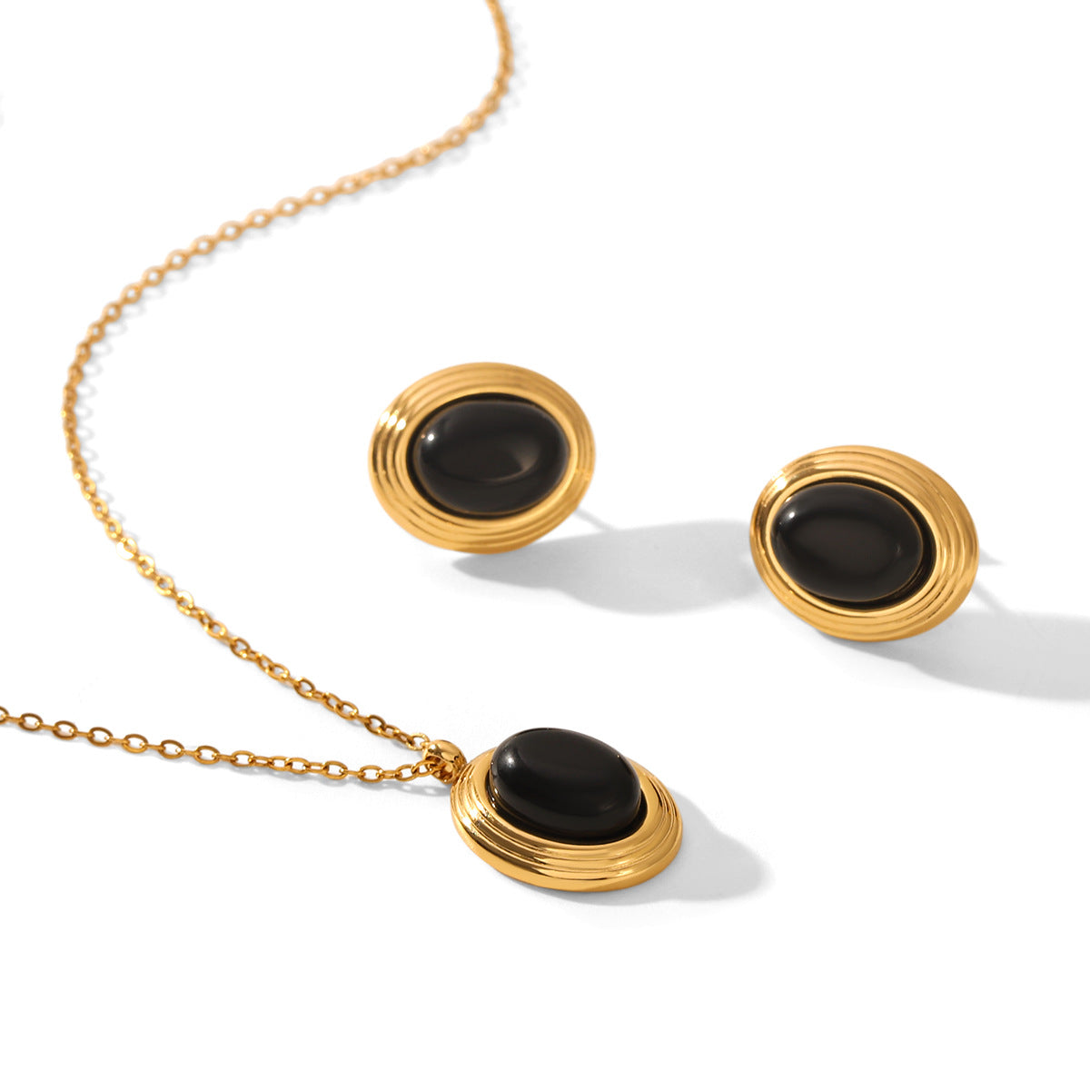 Lillian Gold Tone Black Stone Earrings