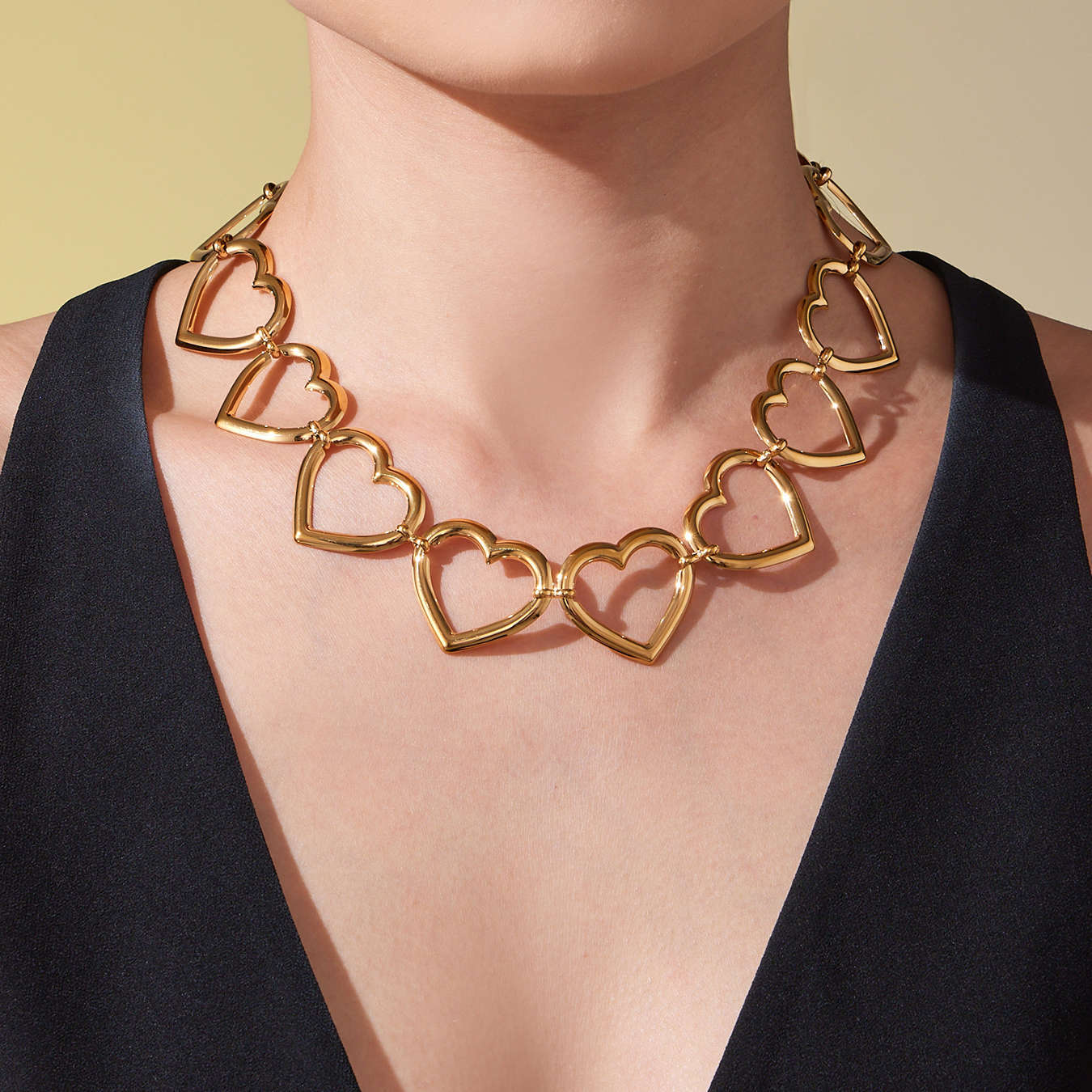 Olive Gold Tone Multiple Hearts Necklace