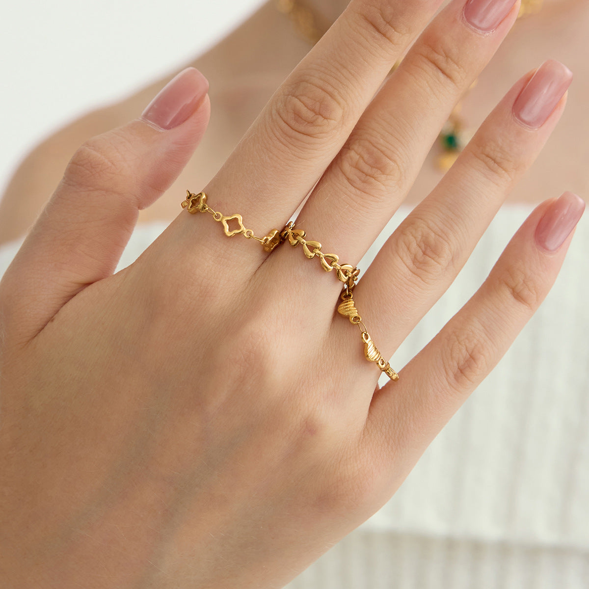 Penelope Gold Tone Clover Chain Ring
