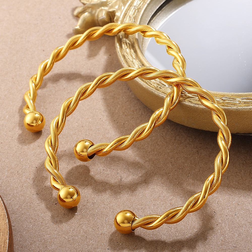 Alora Gold Tone Twisted Cuff Bracelet