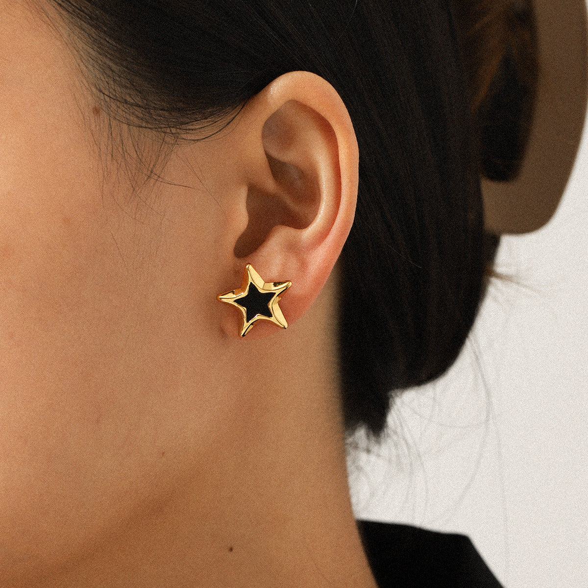 Zoe Gold Tone Black Star Stud Earrings