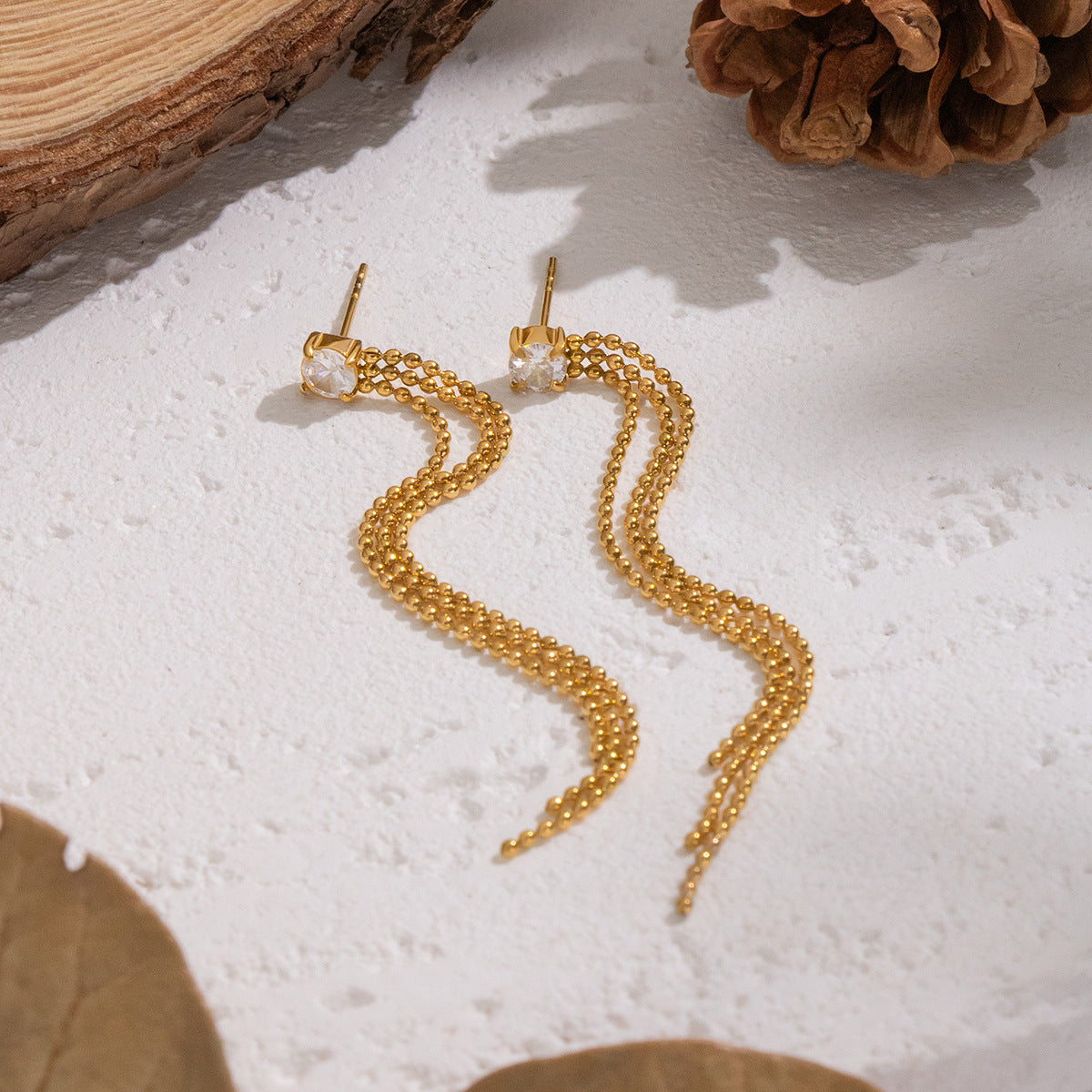 Oakley Gold Tone Zircon Drop Earrings