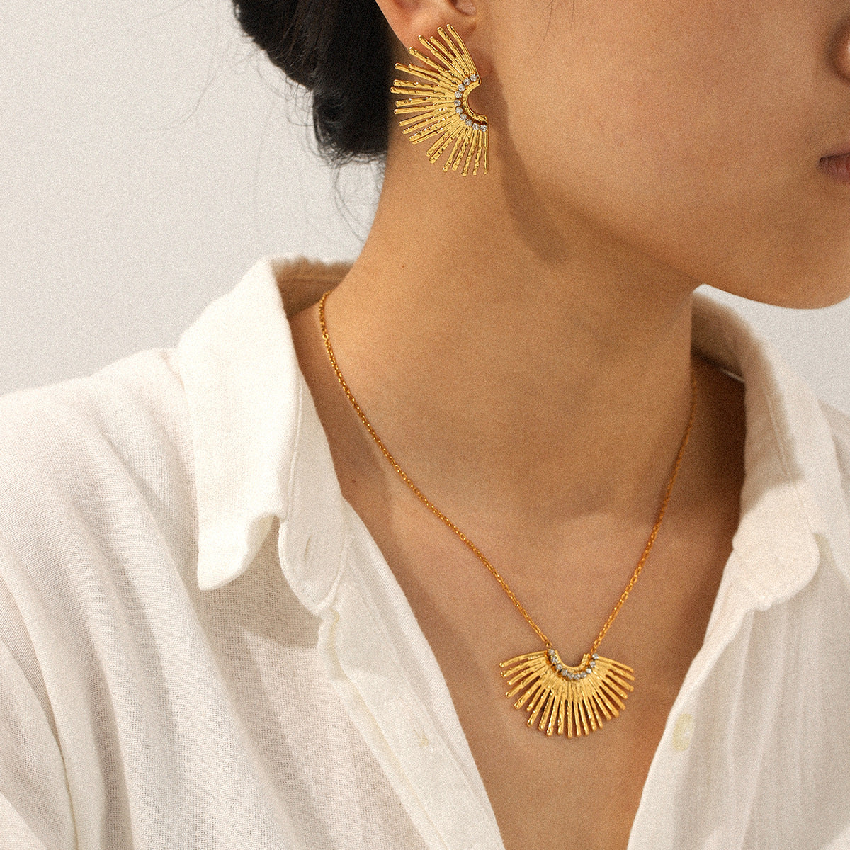 Juniper Gold Tone Wing Zircon Necklace