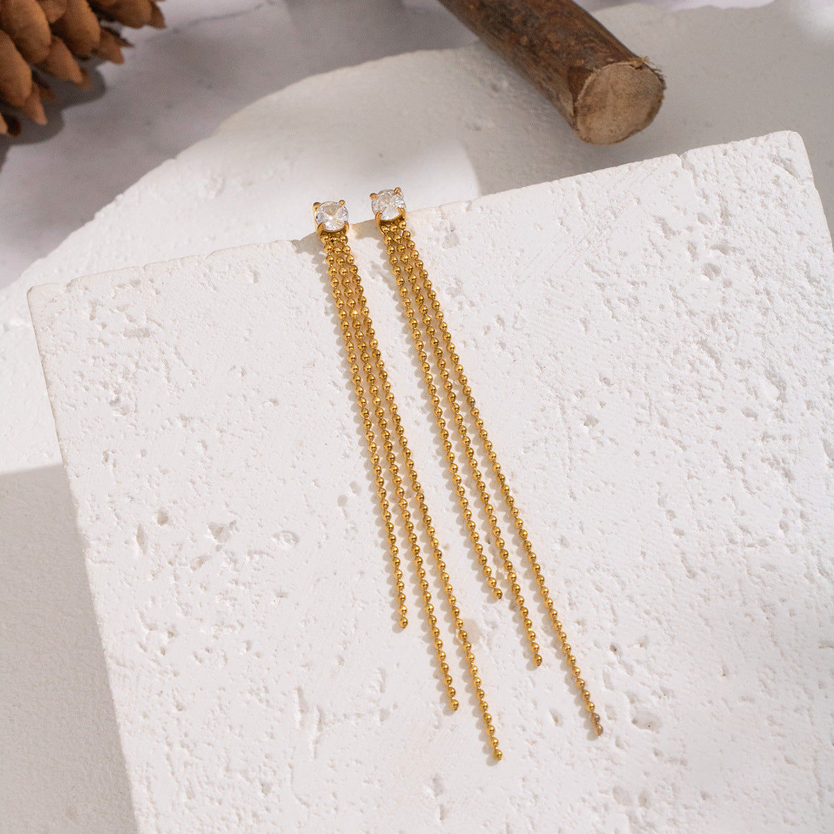 Oakley Gold Tone Zircon Drop Earrings