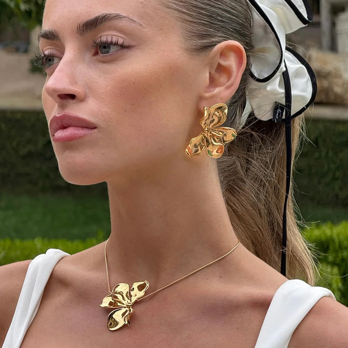 Olivia Gold Tone Flower Statement Earrings