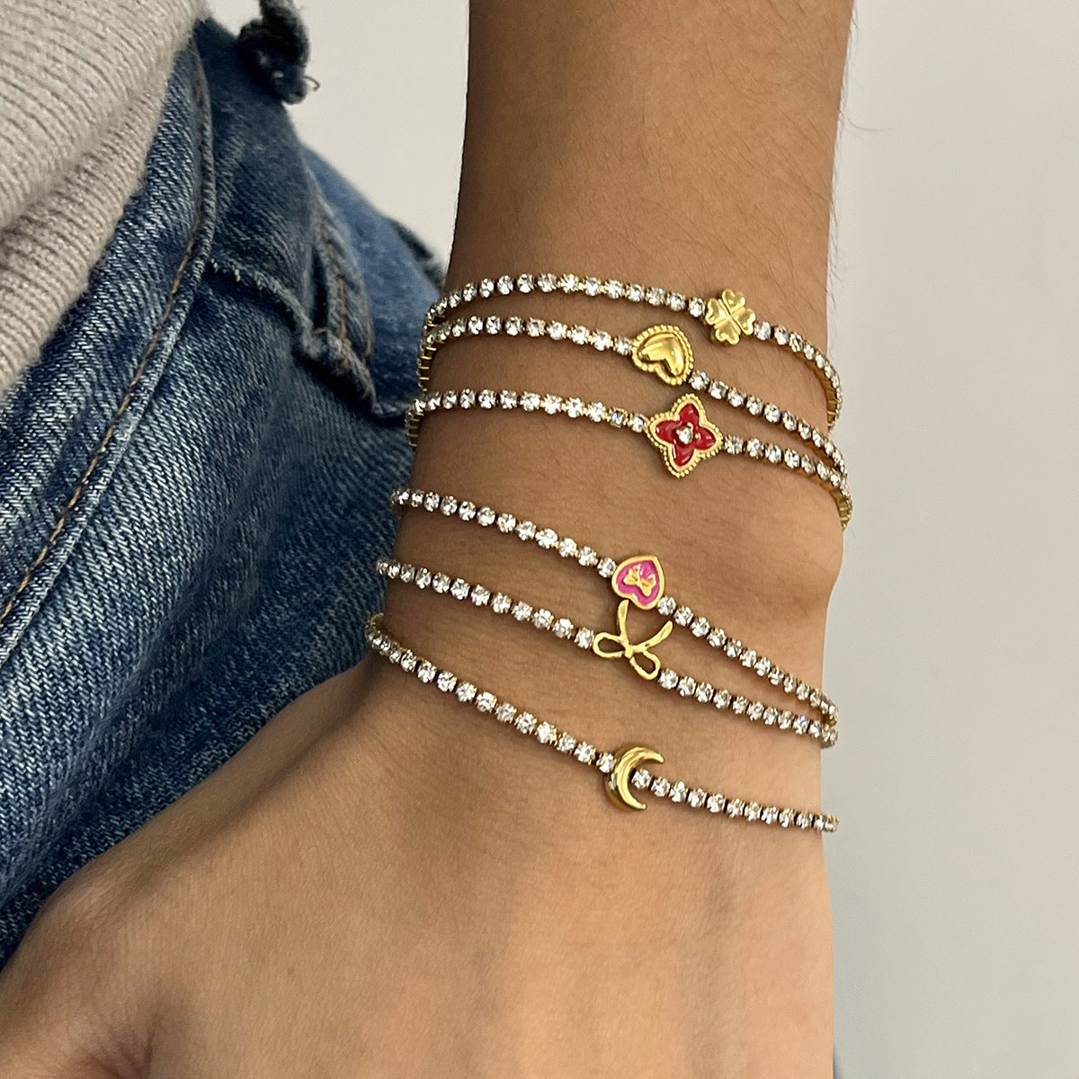 Melody Gold Tone Zircon Bow Bracelet